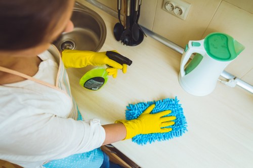 Team member following safe carpet cleaning practices