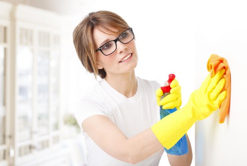 Local window cleaning team working on a Hackney flat block