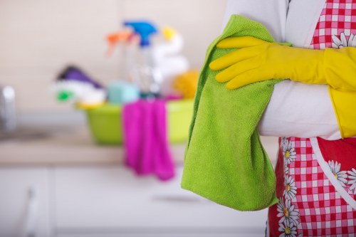 Professional kitchen cleaning in a Hackney flat with attention to surfaces and fittings