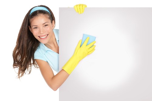 Professional cleaners working in a Hackney commercial space
